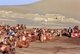 China: Camels rest at the singing sand dunes of Mingsha Shan (Mingsha Hills) in the Kumtagh Desert, Gansu Province